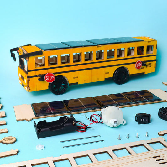 Dual power school bus STEM model kit with battery and solar panel